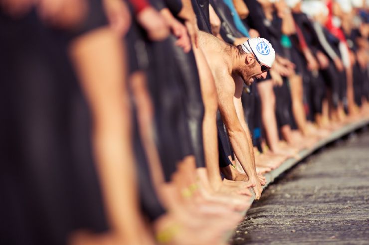 This photograph was taken just before the start of the Geneva International Triathlon, while the athletes were warming up for the swimming leg of the event.
