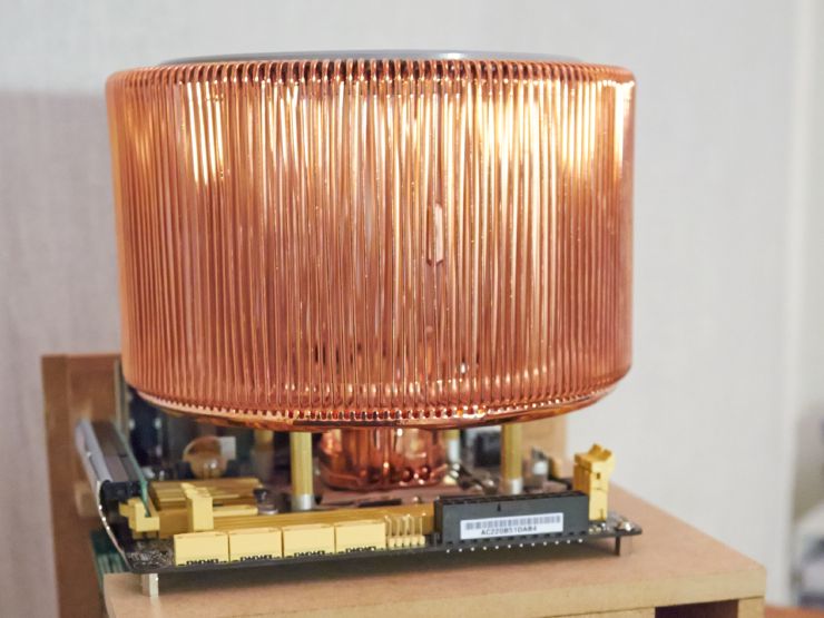 Nofan CR-95C heatsink on a Mini-ITX motherboard. The heatsink has a diameter as large as the motherboard if not more and about 20cm high. It's composed of thin copper tubes placed vertically in circle.